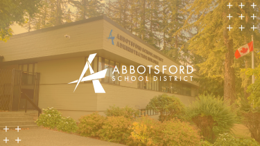 Abbotsford School Board Office with gold overlay on image Abbotsford School Board Office with gold overlay and logo in the middle of image