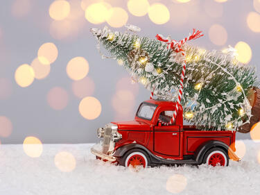 Red truck with Christmas tree 