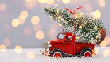 Red truck with Christmas tree 