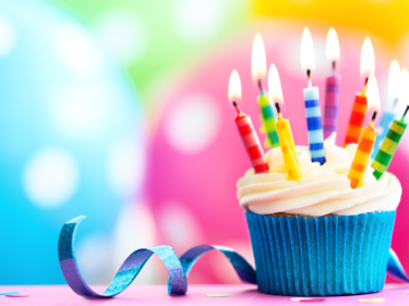 Colorful cupcake with candles