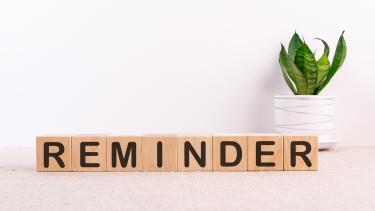 Reminder sign on wooden blocks