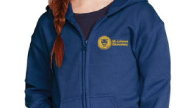 Primary school redheaded girl wearing school spirit wear hoodie